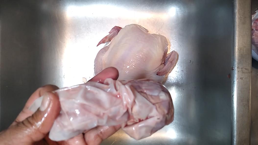 Giblet bag removed from the chicken's cavity.