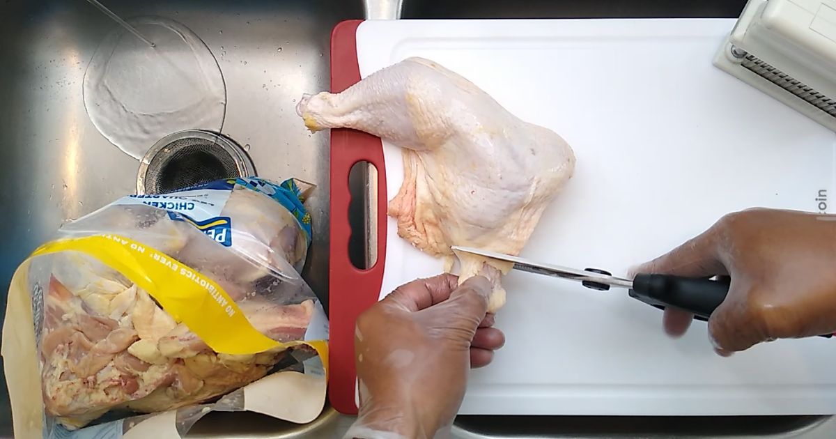 Removing the chicken tail.